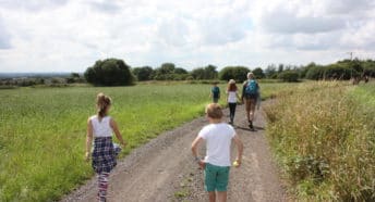 Family walking in Hulton Park