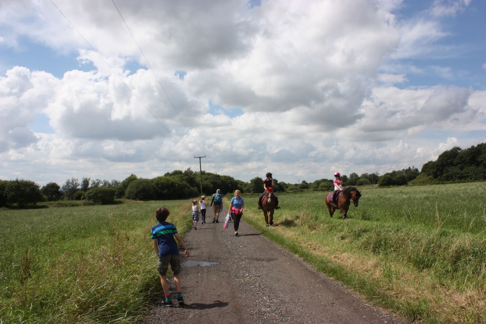 Pedestrians and horse riders on the right of way through Hulton Park